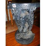 A small late 20th century resin table with dragon base, 20" high.