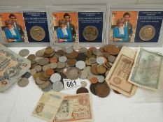 A mixed lot of old coins and bank notes.