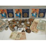 A mixed lot of old coins and bank notes.