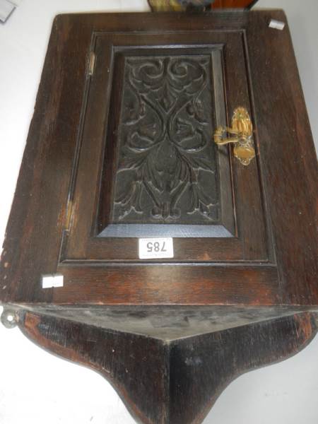 An early 20th century carved oak corner cupboard, 30" tall. - Image 2 of 3