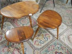 A nest of 3 Ercol tables.