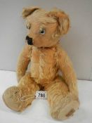 A Merrythought Teddy bear, some wear to fur and pads.