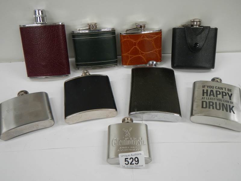 9 20th century hip flasks (6 leather coloured,