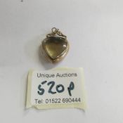 A 9ct see through heart locket, 6.4 grams.