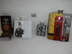 4 advertising hip flasks.