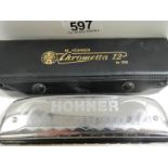 A Hohner Chrometta 12 harmonica.