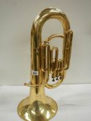 A Lark brass euphonium, No. M4052 complete with mouthpiece, 24" long.