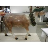 A full size model of a reindeer, 36" tall x 60" long (crack to back leg).