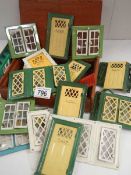 A good lot of vintage metal dolls house doors and windows.