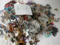 A very large collection of unsorted costume jewellery (crate not included)