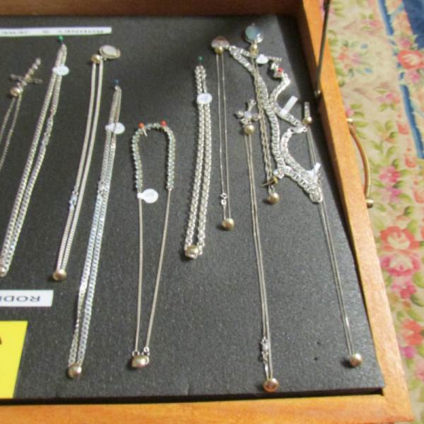 A display case of mainly silver pendants, chains etc., (this lot is buyer collect only). - Image 6 of 10