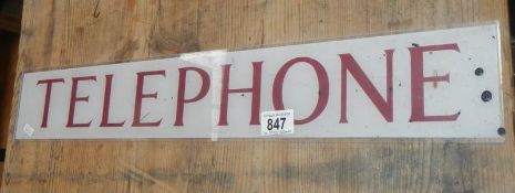 An old perspex telephone sign, 25" x 4".