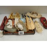A quantity of vintage dolls shoes.
