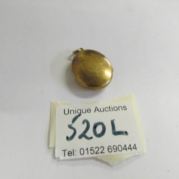 A 9.9 gram 18ct gold locket. - Image 2 of 3