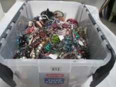 A very large collection of unsorted costume jewellery,