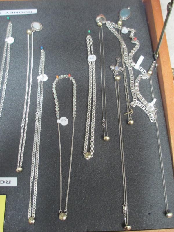 A display case of mainly silver pendants, chains etc., (this lot is buyer collect only). - Image 9 of 10