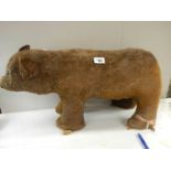 An early Chad Valley bear, 25" long by 13" high.