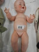 A 15" Victorian porcelain headed doll, 15" tall.