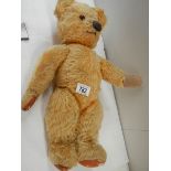 An old Chad Valley Teddy bear, in fair condition apart from pads.