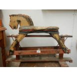 A 1950's wooden rocking horse.