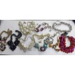 10 various design costume necklaces.