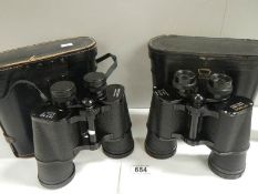 A pair of Super Zenith 12 x 50 binoculars together with a pair of Optomax 10 x 50 binoculars.