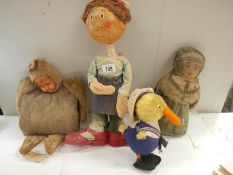 3 old dolls including one as a muff and a duck.