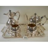 A good quality silver plate 4 piece tea set on a silver plate tray.