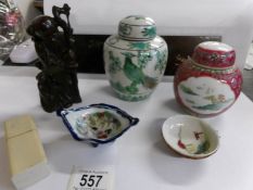A collection of Japanese and oriental ceramics, a wooden panel, sage figure etc, 7 items in total.