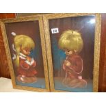 A pair of paintings of children.