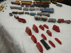 A box containing various small die cast Lone Star rail related models (approximately 45 pieces).