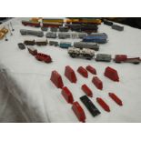 A box containing various small die cast Lone Star rail related models (approximately 45 pieces).