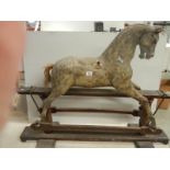 A Victorian wooden rocking horse in good condition for age, rear a/f.