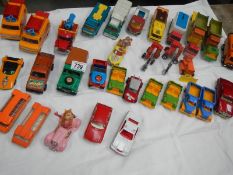 A box of various die cast including Britain's, Corgi and Dinky.