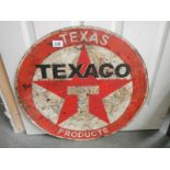 An old metal Texaco sign. ****Condition report**** Diameter approx. 59cm.