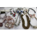 10 various design costume necklaces.