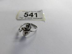 An unusual vintage Lucky Pixie ring in silver.