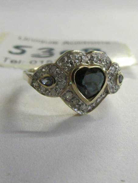 A heart shaped yellow gold diamond and amethyst ring, size N.