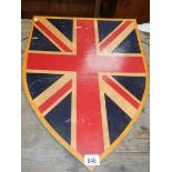 An old wooden shield, 24" x 18".