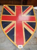 An old wooden shield, 24" x 18".