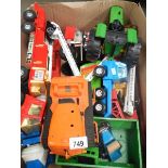 A box of various metal Tonka toys including fire engines.