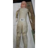 A Victorian porcelain headed doll with kid body, needs wig, 22" tall.