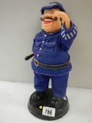A battery operate laughing policeman, in working order.