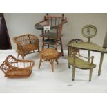 A mixed lot of vintage dolls house furniture including French dressing table and stool.