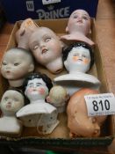 9 Victorian porcelain dolls heads including French and German (see images).