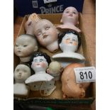 9 Victorian porcelain dolls heads including French and German (see images).