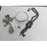 A quality paste long necklace by Kirsh of London together with a vintage tiara and a pear shaped