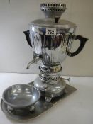 A 20th century Russian samovar complete with tray and dish, 20" tall.