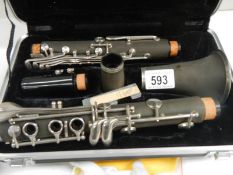 A cased jazz clarinet.