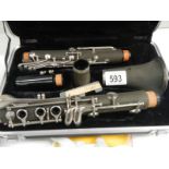 A cased jazz clarinet.